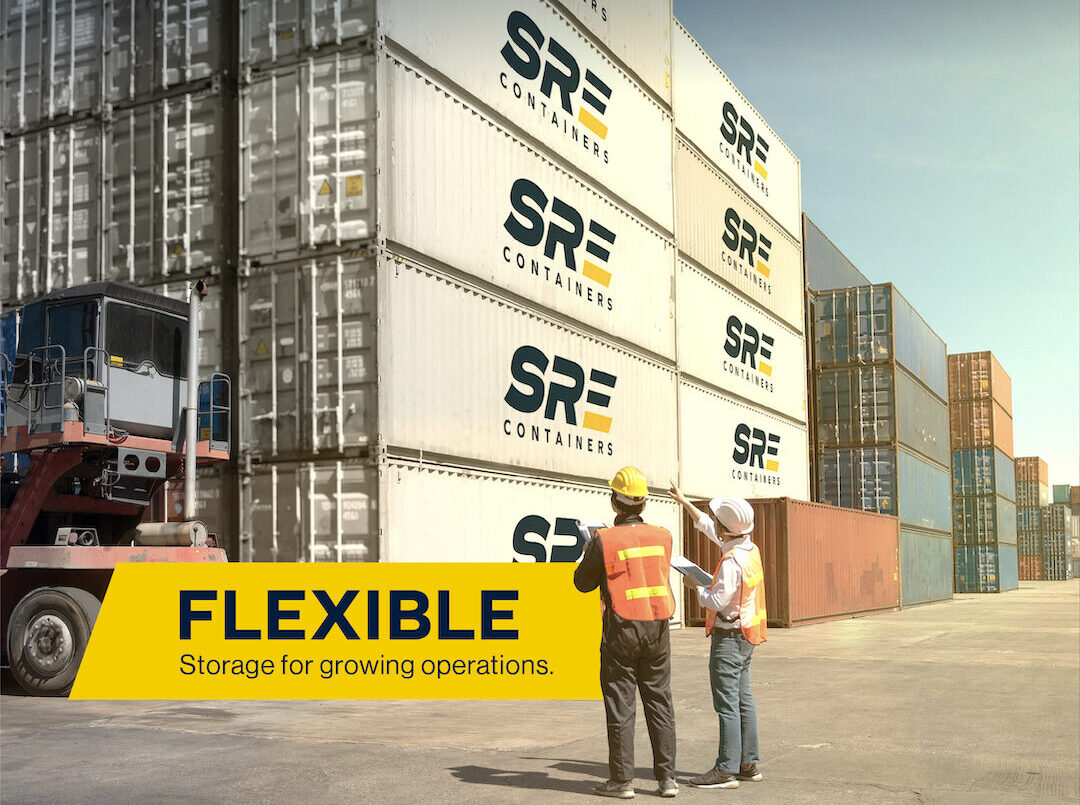 Field full of SRE Containers with two employees